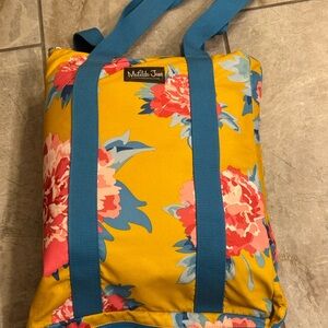Matilda Jane Yellow Floral Tote with Blue Straps unfolds to wipeable large pad